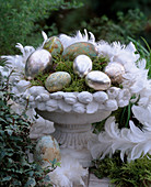 Stucco bowl with moss, duck and chicken eggs in gold leaf