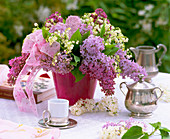 Scented bouquet with Convallaria majalis (Lily of the Valley), Syringa vulgaris (Lilac)