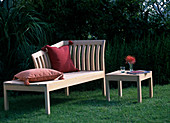 Garden lounger with side table