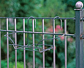 Iron box holder for balcony railing