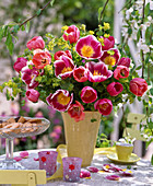 Tulipa (tulip), Euphorbia (spurge), yellow vase