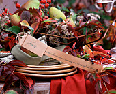 Napkin with name 'Fritz', Clematis (woodland vine), Parthenocissus (wild vine)