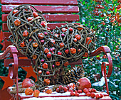 Heart of tendrils on a red chair