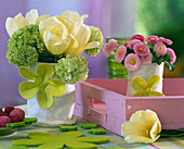 Small bouquets of tulips, snowballs and daisies