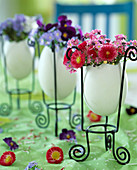 Bouquets in goose eggs as vases
