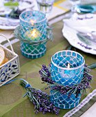 Blue mosaic lanterns with Lavandula (lavender)