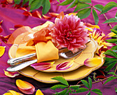 Festive dahlia table decoration on the terrace