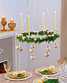 Hanging advent wreath of Chamaecyparis (false cypress)