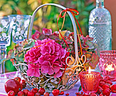 Hydrangea in beige metal handle basket