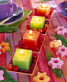 Modern Advent wreath with colorful candles
