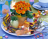 Easter, primula acaulis, ceramic eggs with cress