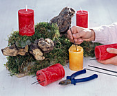Advent wreath with gnarled branch and moss (3/5)