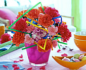Carnation arrangement with coloured plastic straws (3/3)