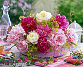 Arrangement of Paeonia, Alchemilla, grasses