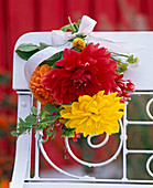 Small bouquet of Dahlia (dahlias) as decoration on chair