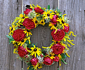 Wreath with red roses and rudbeckia (3/3)