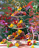 Etagere with fruit and flowers