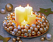 Advent wreath of small golden and silver Christmas tree balls