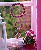 Wreaths of broom heather at the window