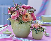 Ranunculus bunch in coffee pot