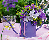 Bouquet of campanula, alchemilla, grasses