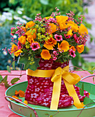 Bouquet made of Eschscholzia, Geum, Alchemilla