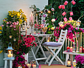 Evening balcony with fairy lights, lanterns and candles