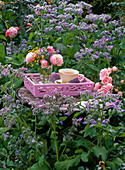 Small bouquet of pink (roses) and herbs