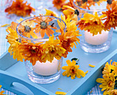 Lantern with wreath made of autumn chrysanthemums