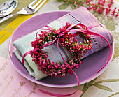 Wreaths of Erica (bell heather) on napkin, purple