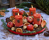 Advent wreath with Malus (apples), cones of Picea (spruce)