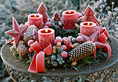 Advent wreath of various coniferous branches, cones, nuts
