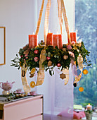 Hanging Advent wreath of mixed conifer greenery