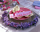 Table decoration with dicentra, wreath from Myosotis