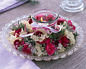 Wreath of dianthus (carnations), hydrangea (hydrangea), leaves of artemisia