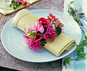 Pelargonium napkin ring around napkin