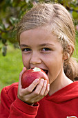 Girl eating apple