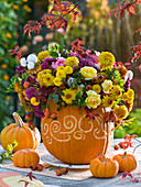 Carved pumpkin as a vase