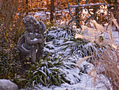 Putto in a snowy bed