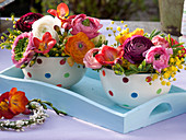 Colorful bouquets in cereal bowls