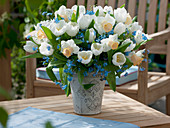 Bouquet of Tulipa 'White Dream' (tulips), Narcissus 'Salome' (daffodils)