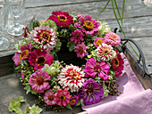 Late summer wreath on wooden tray