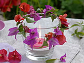 Lantern with a small garland of bougainvillea flowers