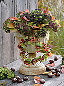 Autumnal iron goblet with hydrangea blossoms