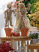 Straw dolls as balcony decoration