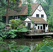 Black AND White Cottage SEEN From THE LAKE. HANNAH PESCHAR GALLERY Garden, Surrey