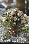 Frozen waxed pink (rose) and cones bouquet