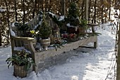 Winter arrangement of wooden bench