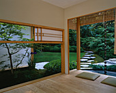 CHELSEA FLOWER Show 2004: JAPANESE Garden by THE JAPANESE Garden SOCIETY. VIEW THROUGH Shoji SCREENS TO TIERED LAWN, STEPPING STONES AND CLOUD HEDGING
