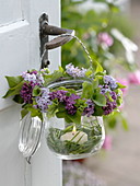 Lantern with wreaths of syringa (lilac) and alchemilla